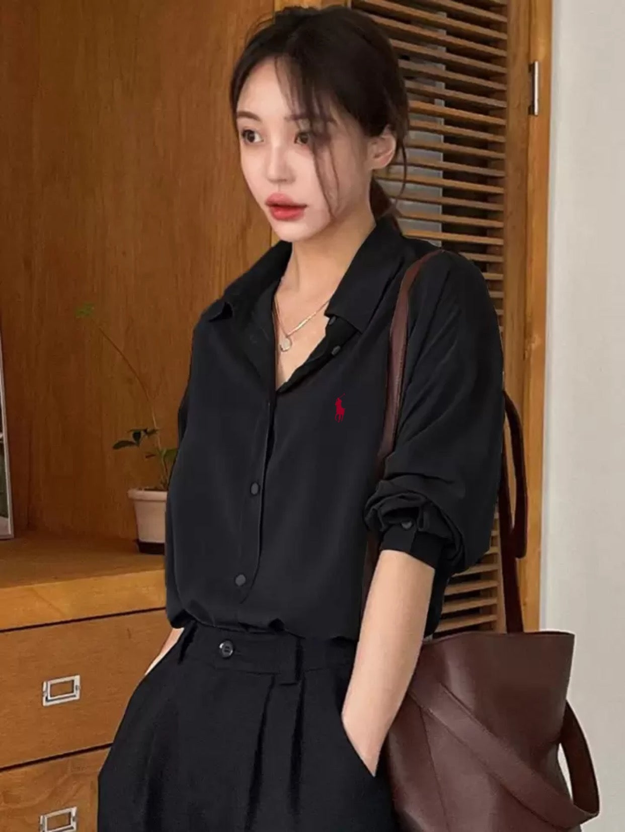 قميص بولو اسود