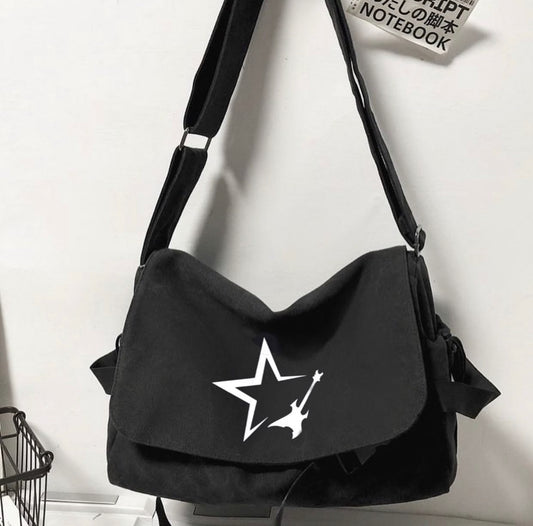 حقيبة نجمة وكيتار