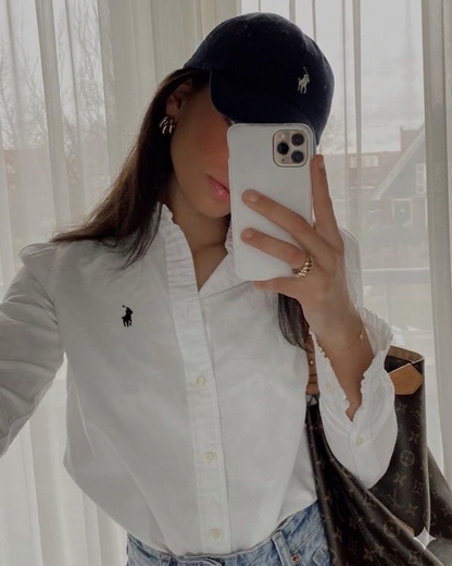 قميص Polo لون ابيض