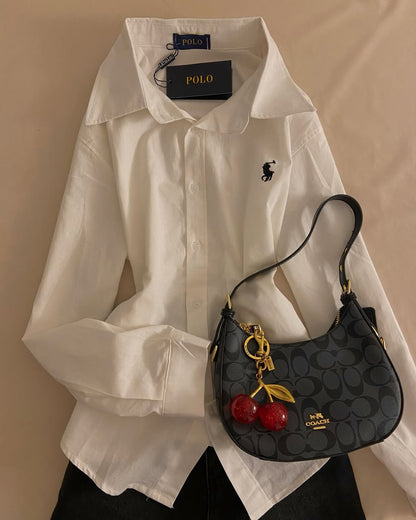 قميص Polo لون ابيض